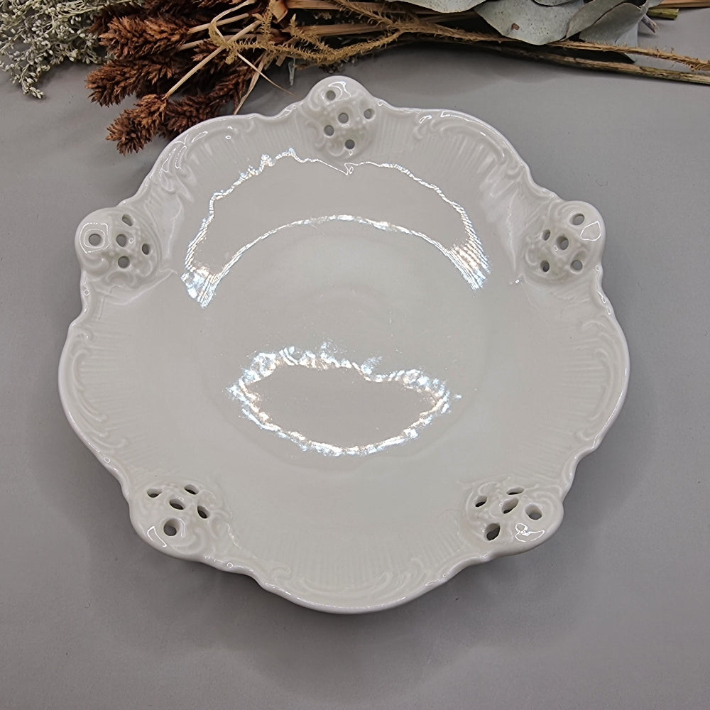 White Rosenthal Classic Rose porcelain dish with pierced edge and embossed scroll detail, made in Germany.
