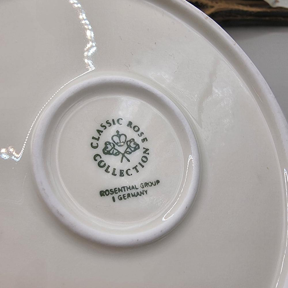 White Rosenthal Classic Rose porcelain dish with pierced edge and embossed scroll detail, made in Germany.