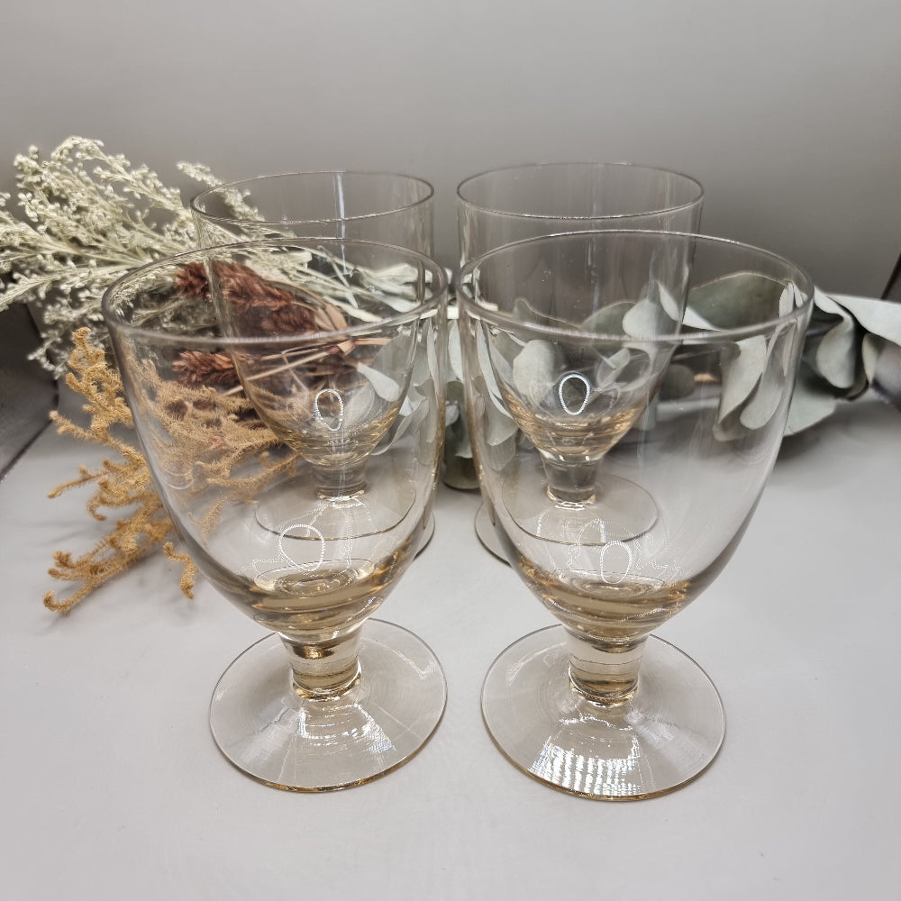 Set of four yellow depression glass goblets