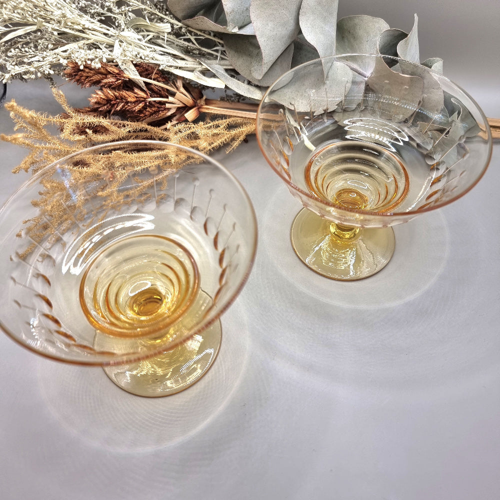 Pair of vintage amber glass dessert coupes with etched detailing