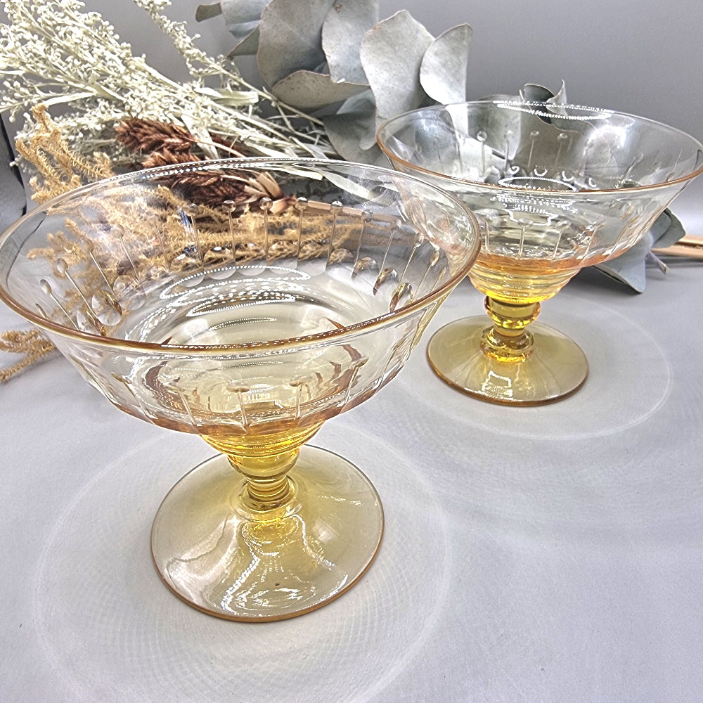 Pair of vintage amber glass dessert coupes with etched detailing