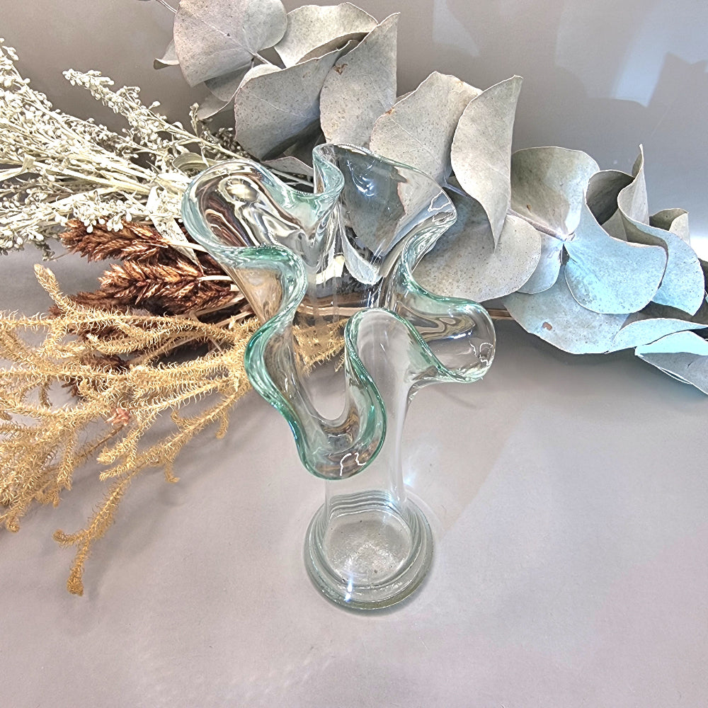Clear handblown art glass vase with ruffled fluted top