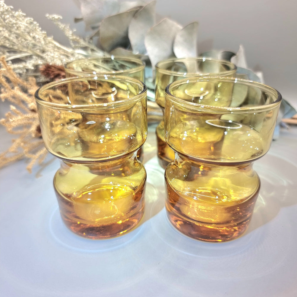 Set of four vintage Crown Crystal amber glasses with anchor design