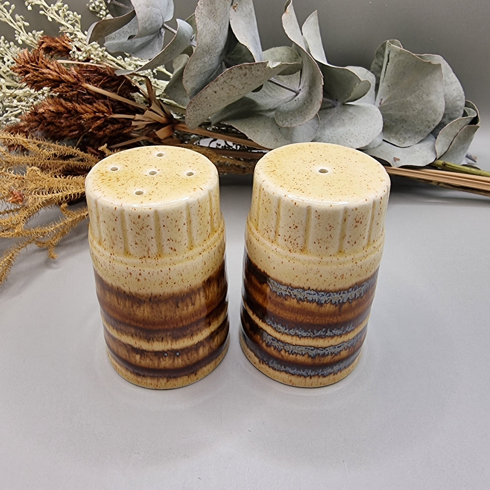 Set of two brown drip glaze ceramic salt and pepper shakers, made in England.