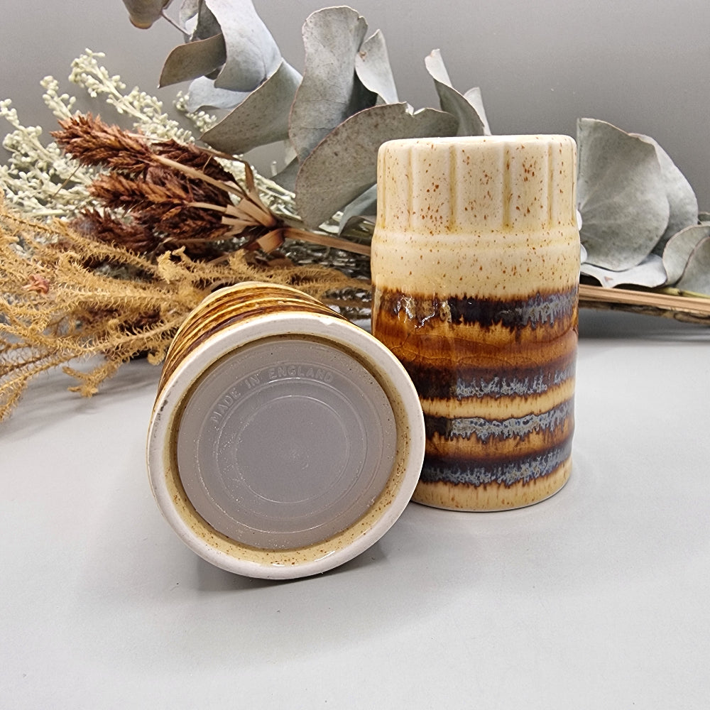 Set of two brown drip glaze ceramic salt and pepper shakers, made in England.