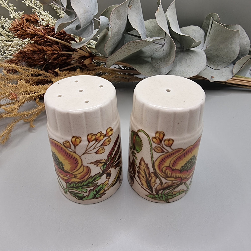 Vintage Palissy salt and pepper shakers with floral print, made in England.