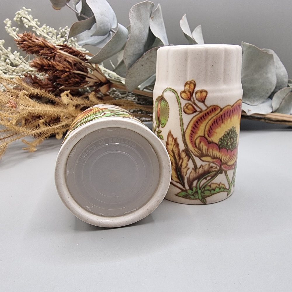 Vintage Palissy salt and pepper shakers with floral print, made in England.