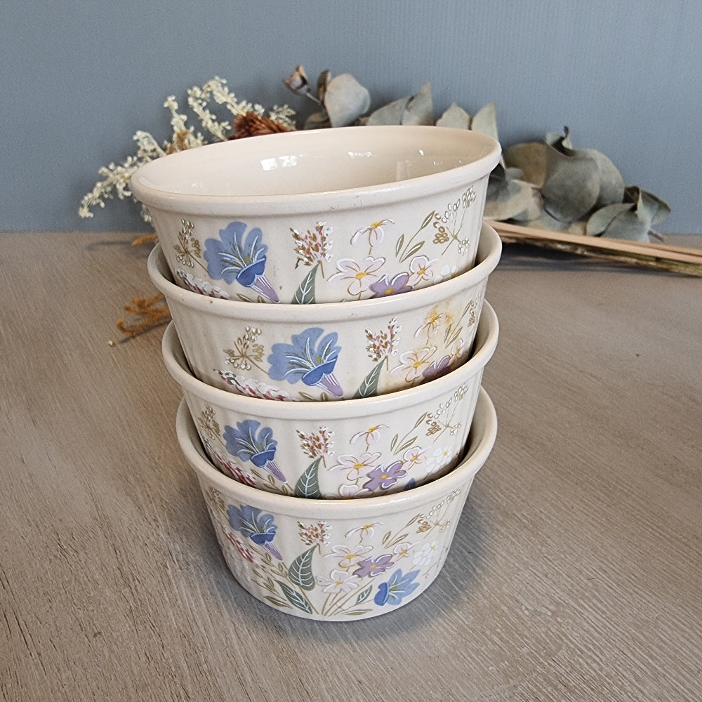 Set of 4 Poole Pottery Springtime bowls with pastel floral decoration.
