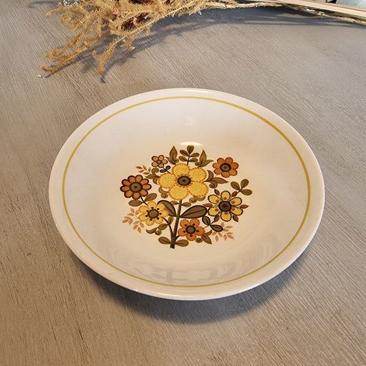 Ridgway Ironstone Harvest Gold bowl with 1970s yellow and orange floral pattern.