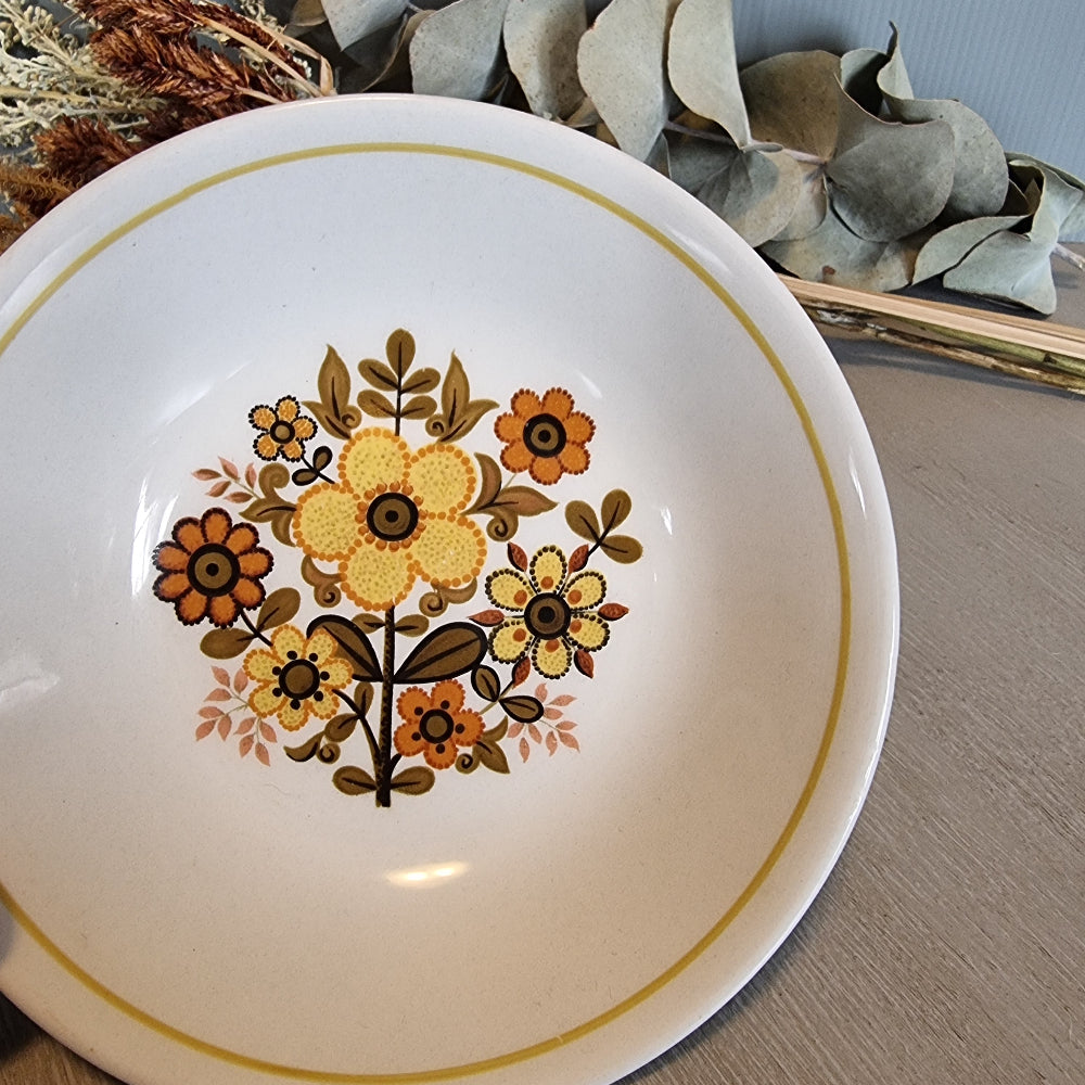 Ridgway Ironstone Harvest Gold bowl with 1970s yellow and orange floral pattern.