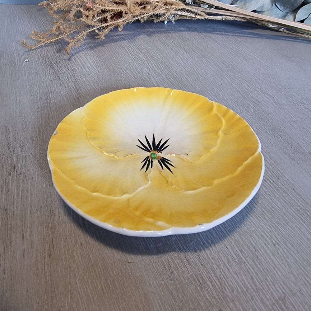 Royal Art Pottery yellow pansy-shaped ceramic dish from England.
