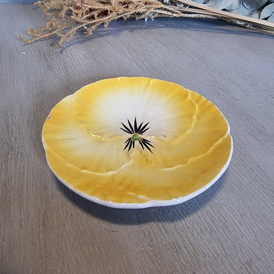 Royal Art Pottery yellow pansy-shaped ceramic dish from England.