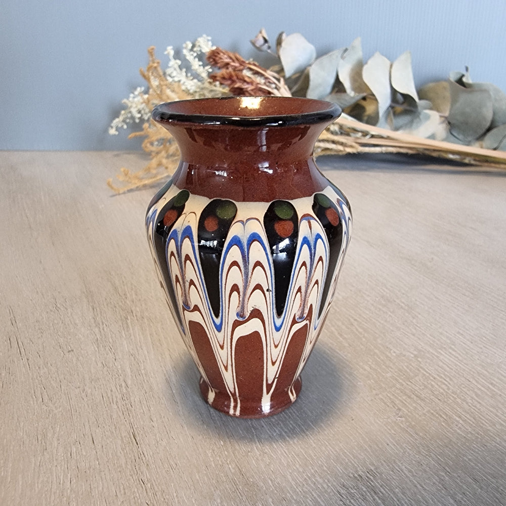 Vintage Bulgarian style vase with folk art drip-glaze in brown, cream, and blue.