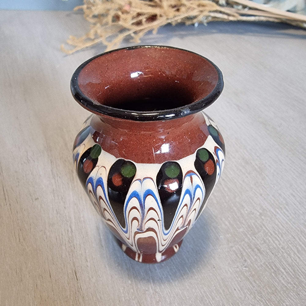 Vintage Bulgarian style vase with folk art drip-glaze in brown, cream, and blue.