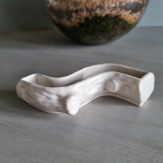 Wade white ceramic log-shaped posy vase with bark texture.