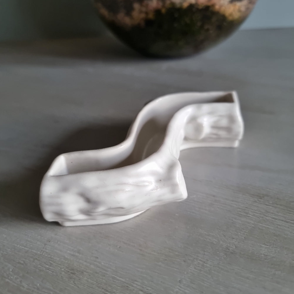 Wade white ceramic log-shaped posy vase with bark texture.