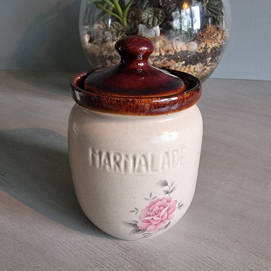 Kermiko Potteries marmalade jar with brown lid and pink floral motif.
