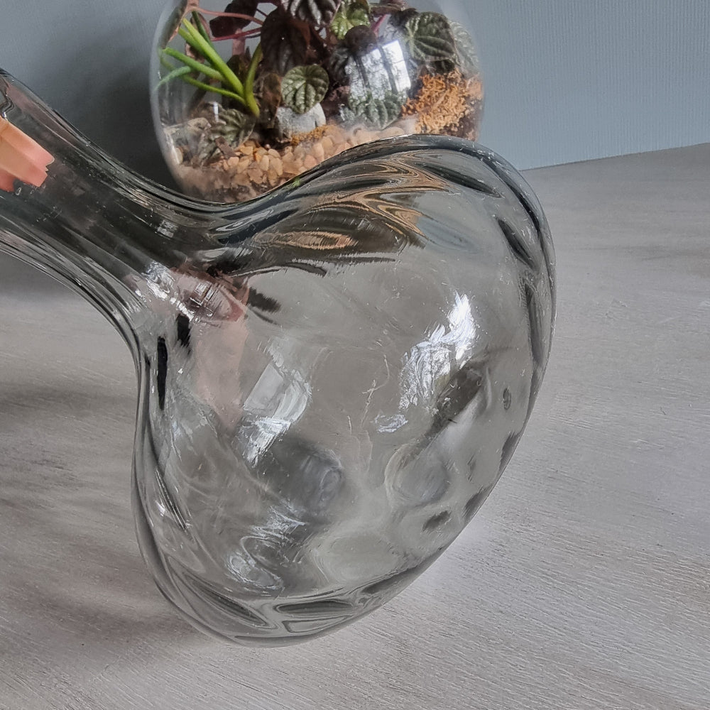 Vintage clear optic glass vase with swirl pattern and fluted neck.