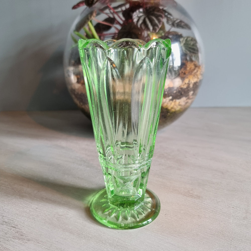 Vintage green Depression glass vase with scalloped rim.