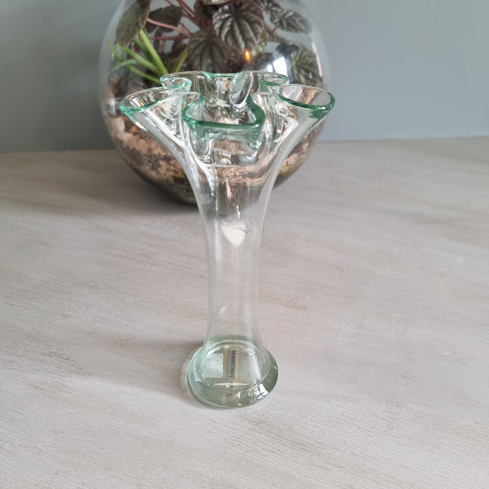 Hand-blown Spanish recycled glass bud vase with soft green tint and flared rim.