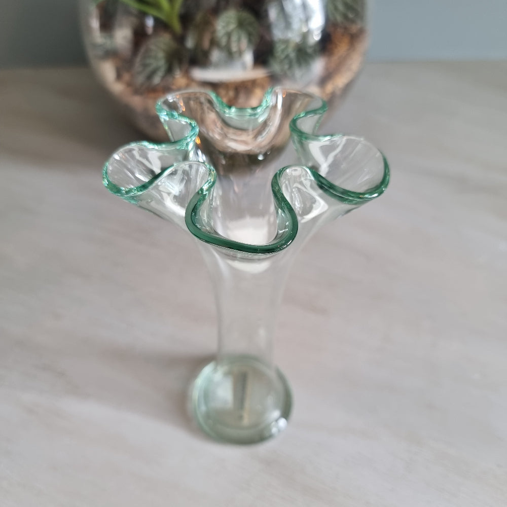 Hand-blown Spanish recycled glass bud vase with soft green tint and flared rim.