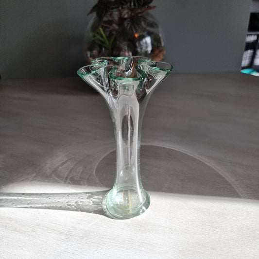 Hand-blown Spanish recycled glass bud vase with soft green tint and flared rim.