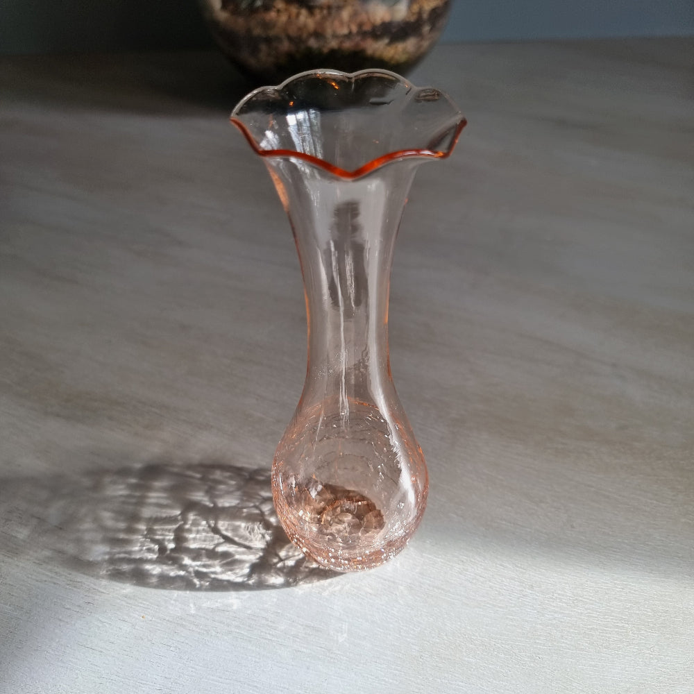 Vintage pink crackle glass bud vase with ruffled rim and soft blush tone.