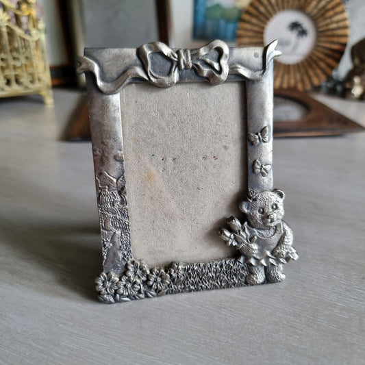 Vintage pewter teddy bear photo frame with bow and butterfly design