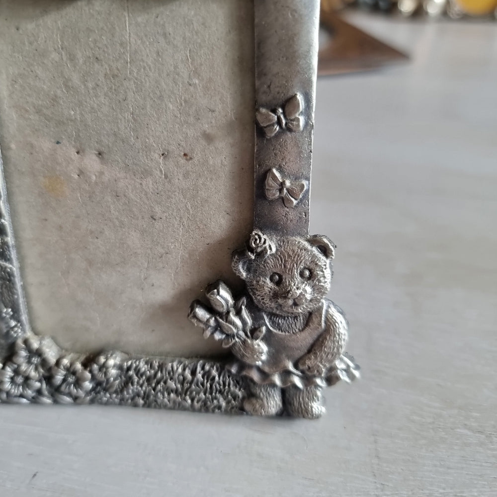 Vintage pewter teddy bear photo frame with bow and butterfly design