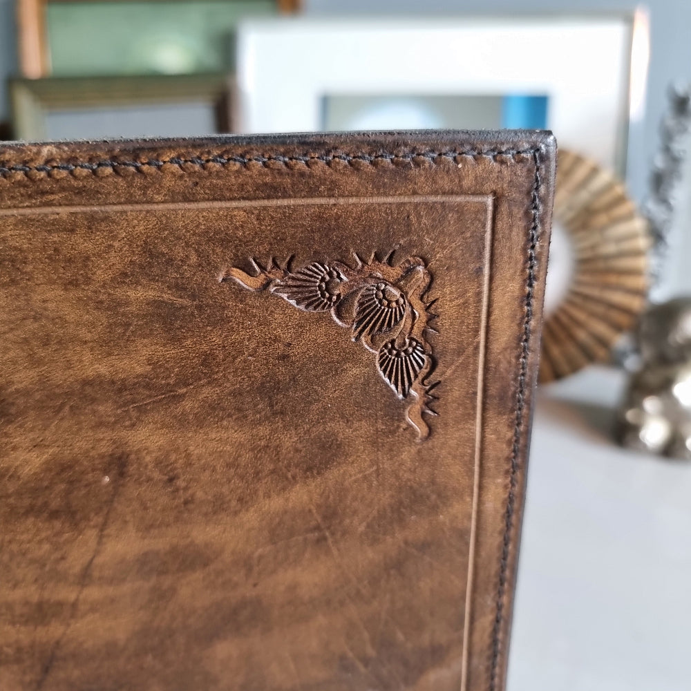 Vintage tan leather double photo frame with embossed detailing