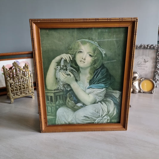 Vintage girl with doves framed print in bamboo-style frame