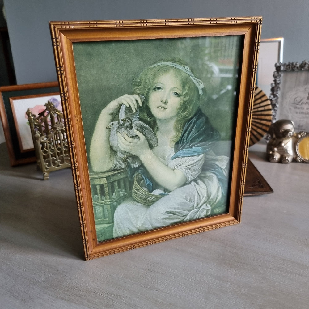 Vintage girl with doves framed print in bamboo-style frame