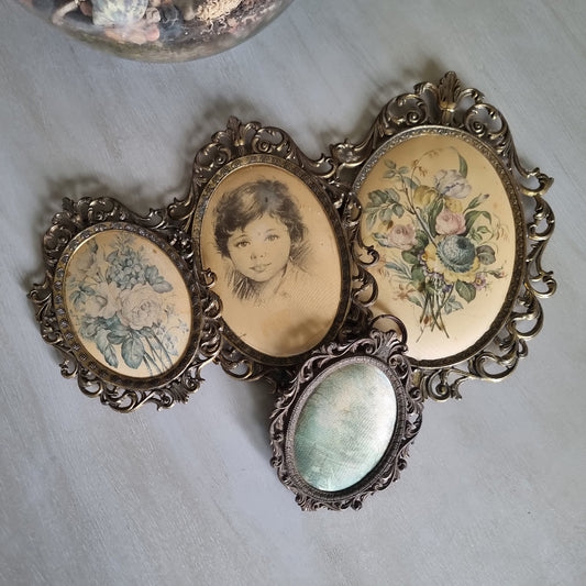Set of vintage Italian brass oval frames with ornate scrollwork and silk prints