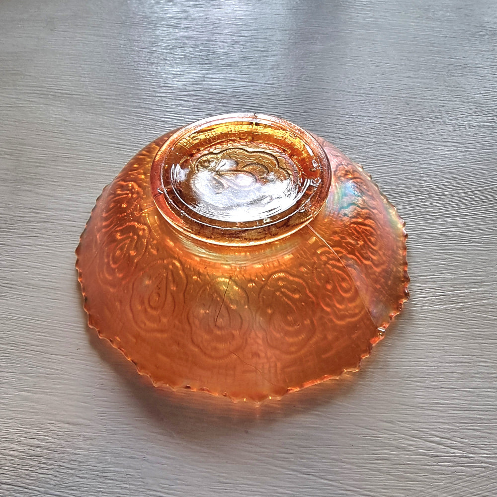 Vintage Fenton Persian Medallion carnival glass bowl with peach iridescent finish and ornate paisley pattern.