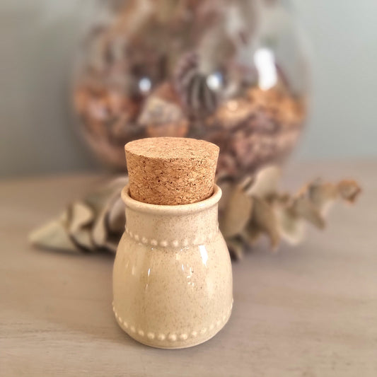 Vintage Crown Lynn New Zealand pottery jar with cork stopper and printed baker illustration