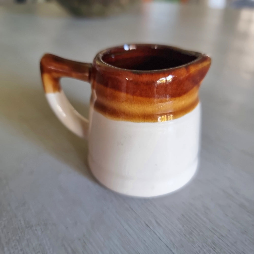Vintage brown drip glaze quarter cup measuring jug with pouring spout. Part of this week's Curious Finds mini treasures drop.