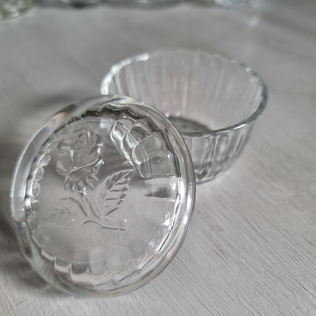 Vintage Luigi Bormioli clear glass rose trinket box made in Italy, with a raised rose lid and ribbed base