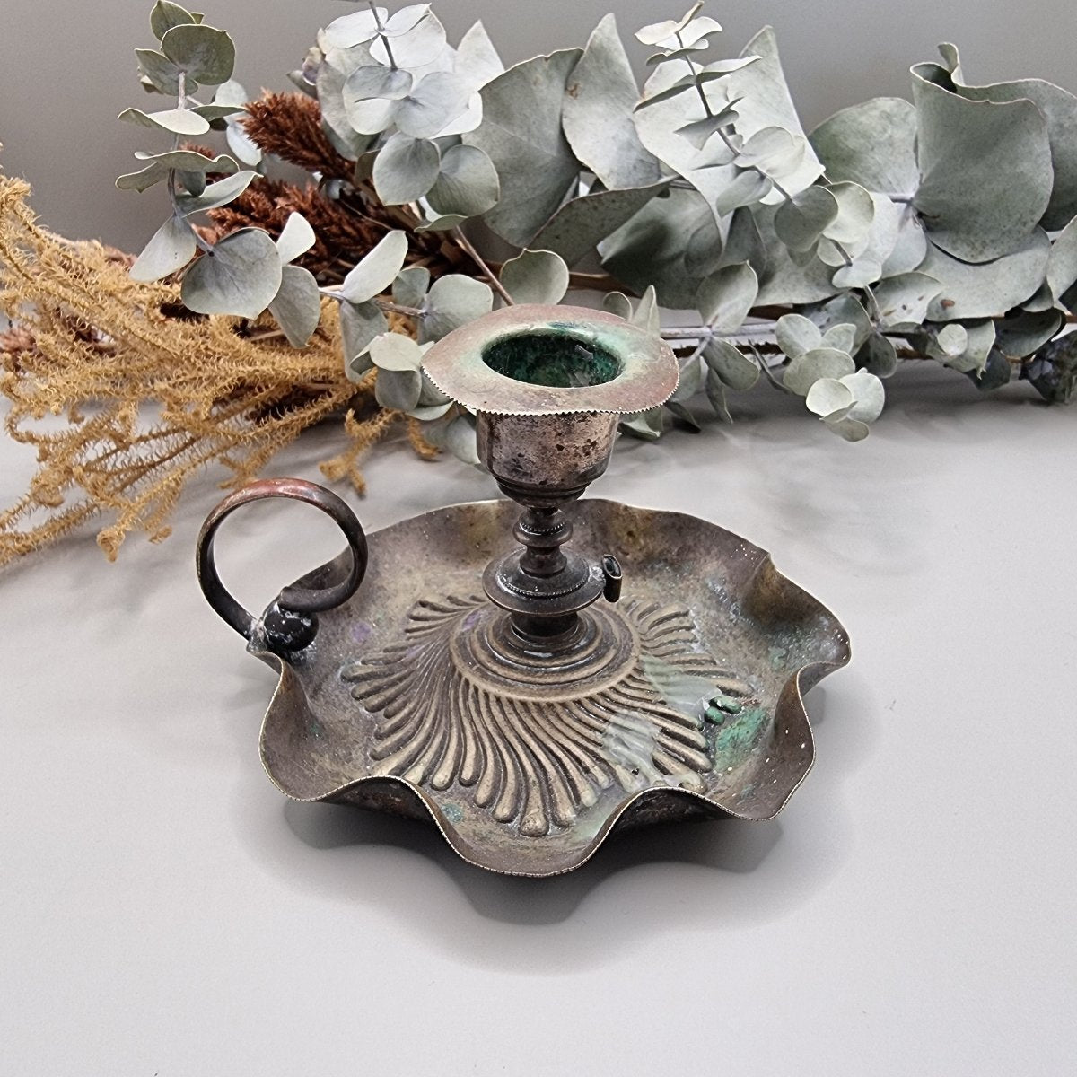 Antique copper candlestick holder