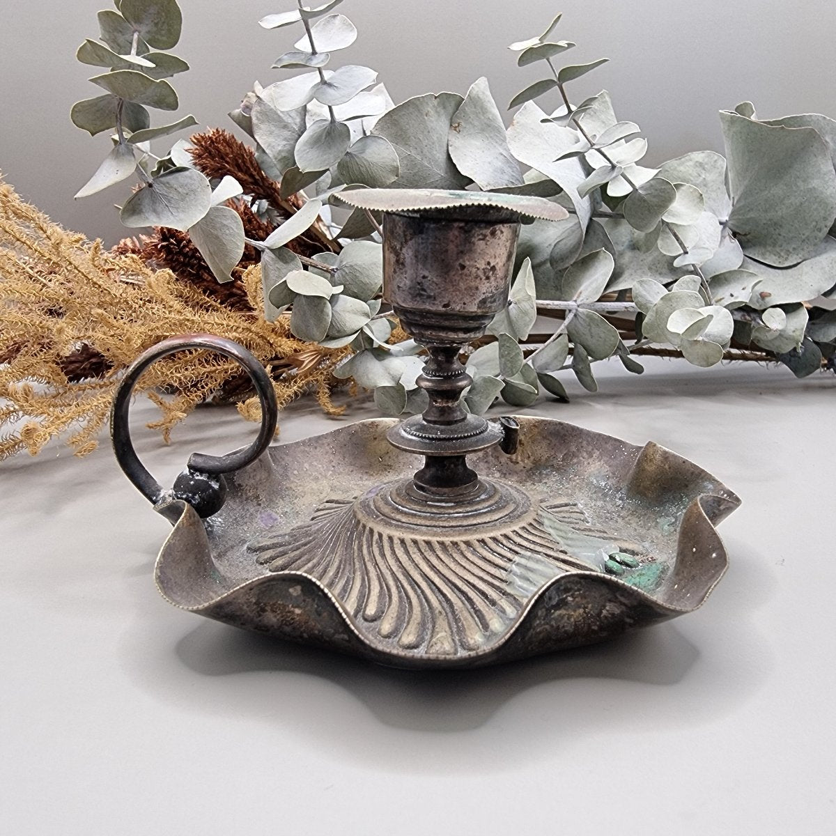 Antique copper candlestick holder