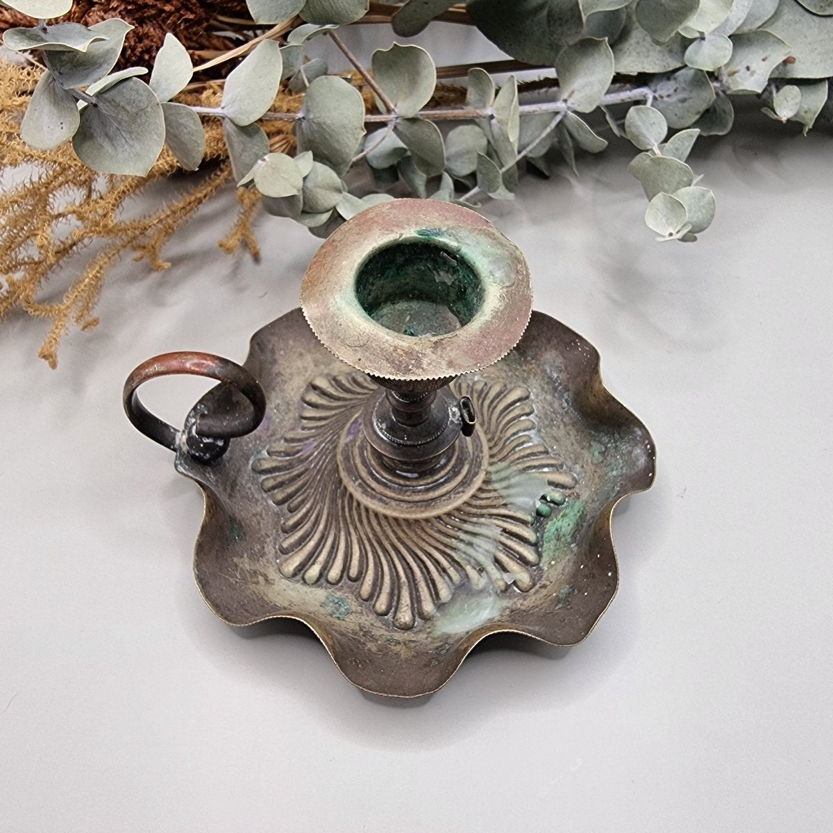 Antique copper candlestick holder