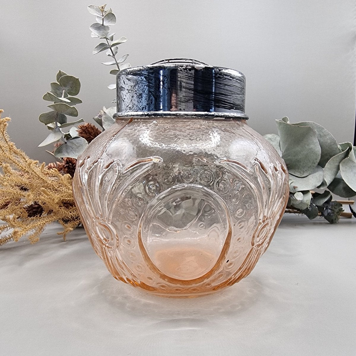 Pink glass flower frog vase