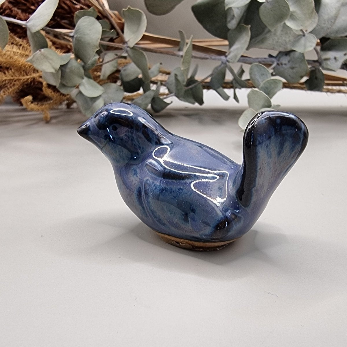 Small hand painted ceramic blue bird