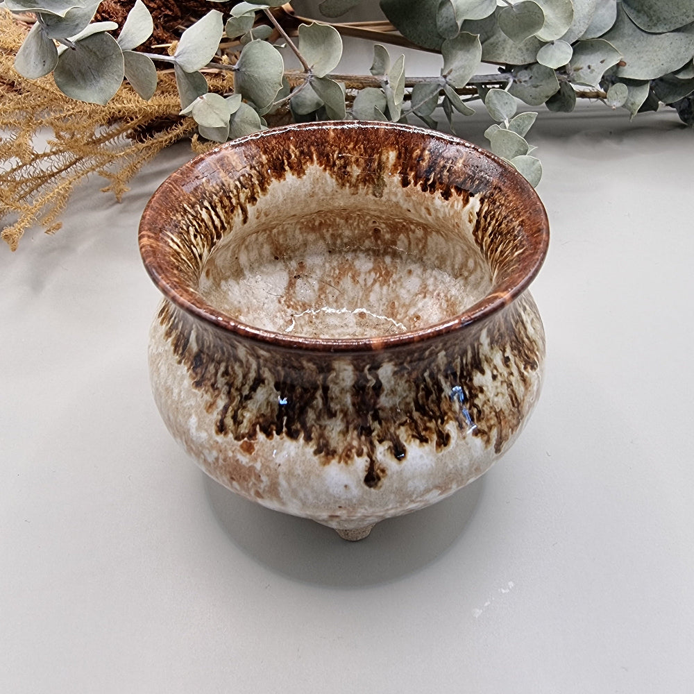 Brown and white glazed footed pot