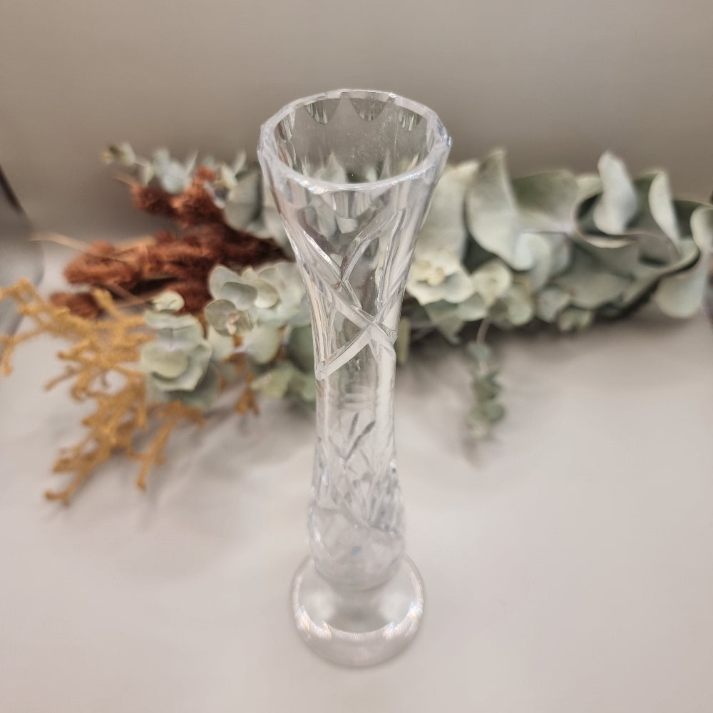 Tall cut crystal bud vase with twisted stem and narrow mouth