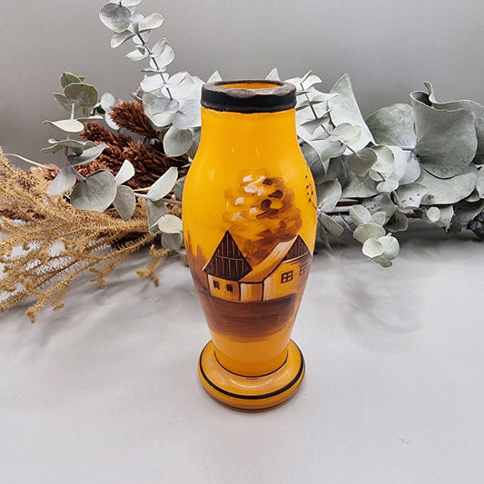 Hand-painted amber vase with rustic cottage scene and pedestal base