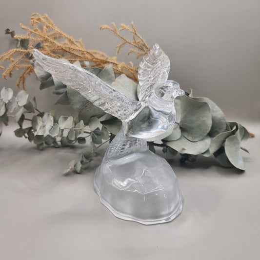 Cristal d'Arques lead crystal dove with wings outstretched on a frosted glass base.