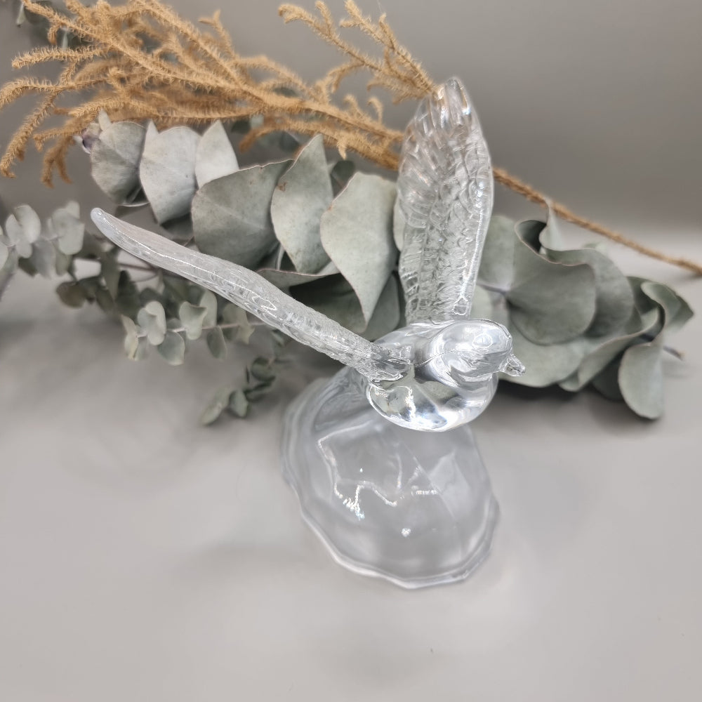 Cristal d'Arques lead crystal dove with wings outstretched on a frosted glass base.