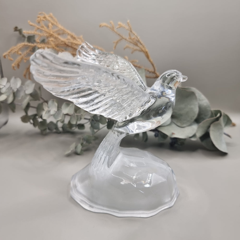 Cristal d'Arques lead crystal dove with wings outstretched on a frosted glass base.