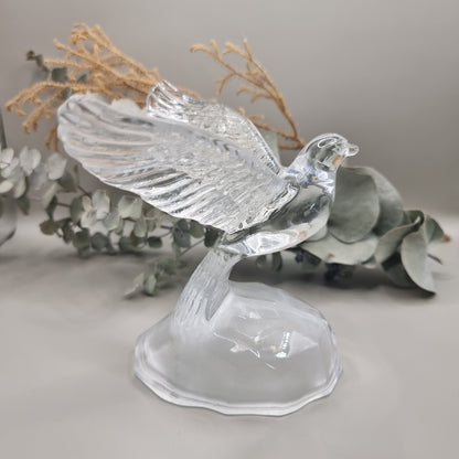 Cristal d'Arques lead crystal dove with wings outstretched on a frosted glass base.