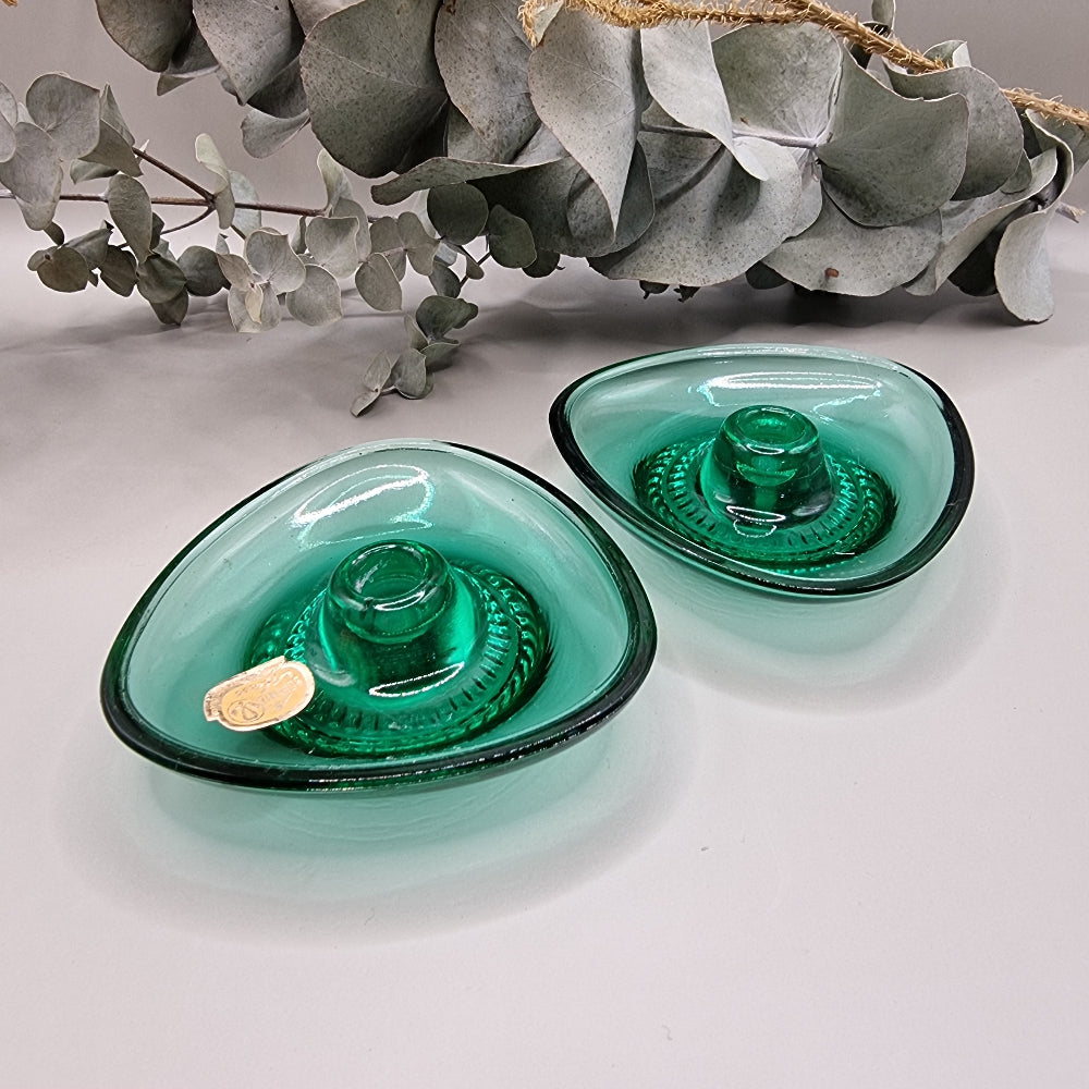 Pair of Bohemia emerald green glass candle holders made in Czechoslovakia with dish design.